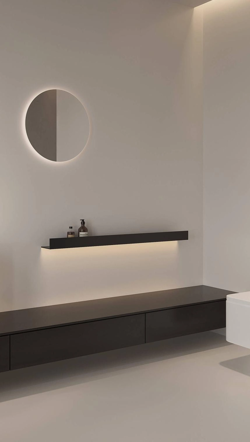 Large gray wall tiles installed in a modern bathroom and shower area